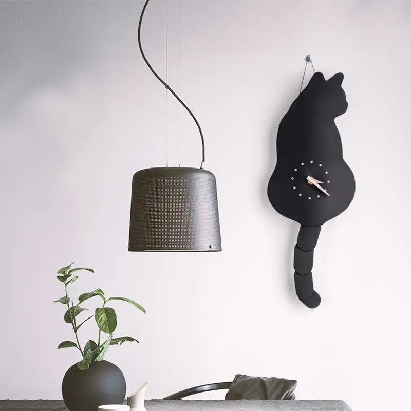 Horloge murale articulée - Vraiment-chat